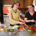 Sarah, Jo, and Steph prepare healthy foods