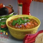 Healthy Bean Dip topped w/ cilantro, onion, tomato
