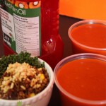 Bright orange tub of red palm oil, plus bowl of quinoa