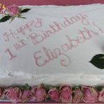 Fancy First Birthday Cake decorated w/ roses